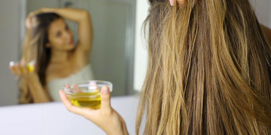 Woman Applying Hair Oil Mask